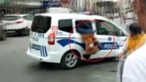 Polis arabasından elleri kelepçeli atlayarak kaçmaya çalıştı!